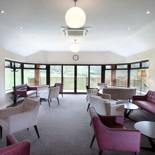 Clubhouse lounge area overlooking green